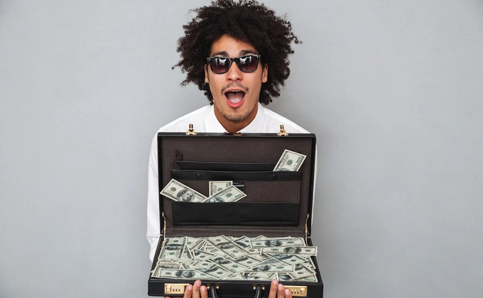 excited man with money