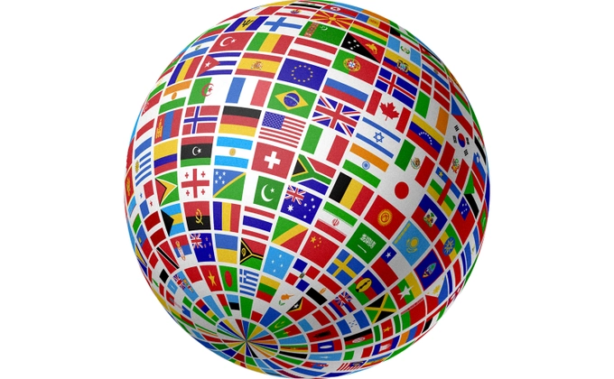 A woman praying fervently with a solemn face