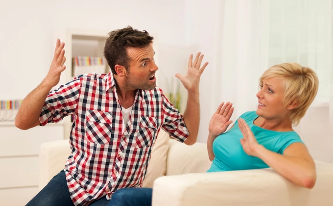 man shouting at woman