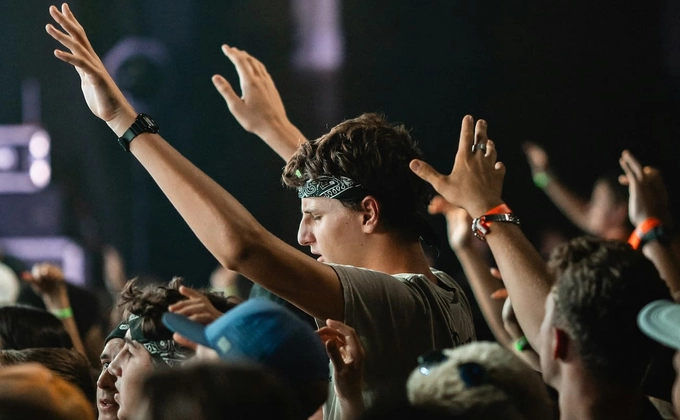 man worshipping in church