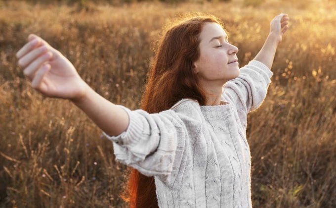 Woman in heartfelt thanksgiving