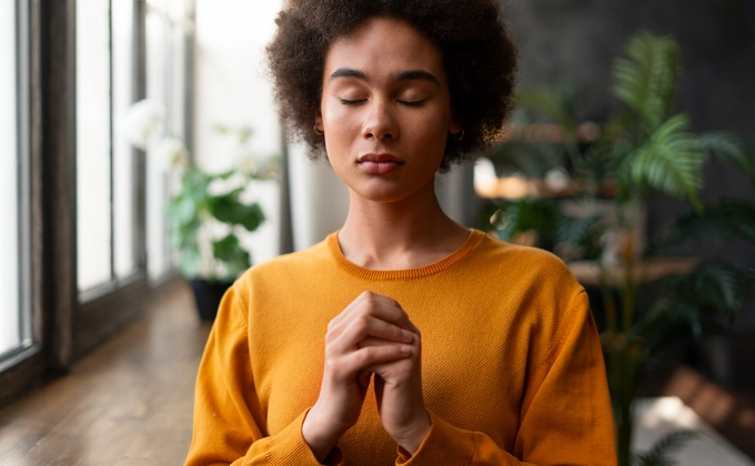 woman praying intensely