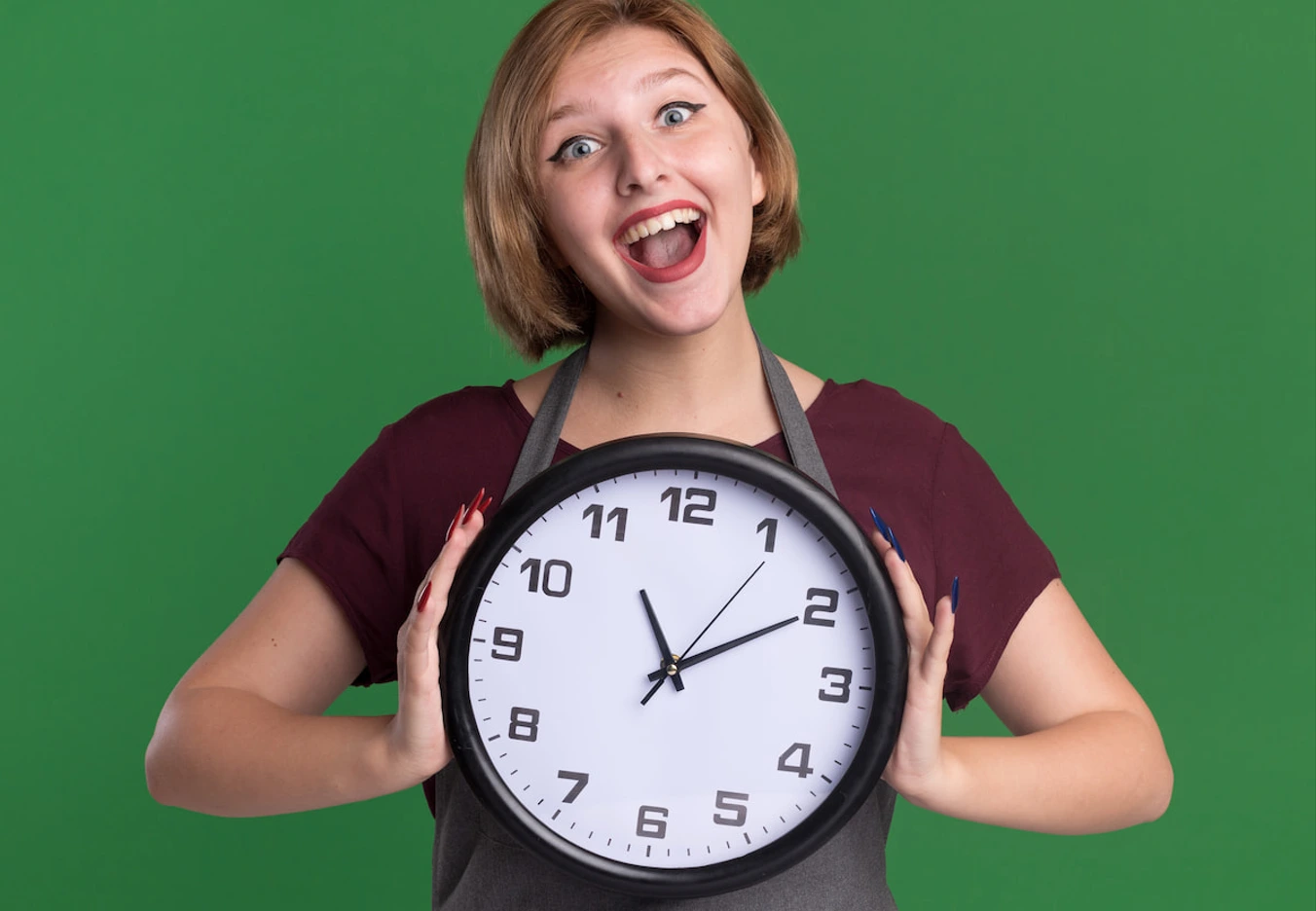 happy woman holding clock