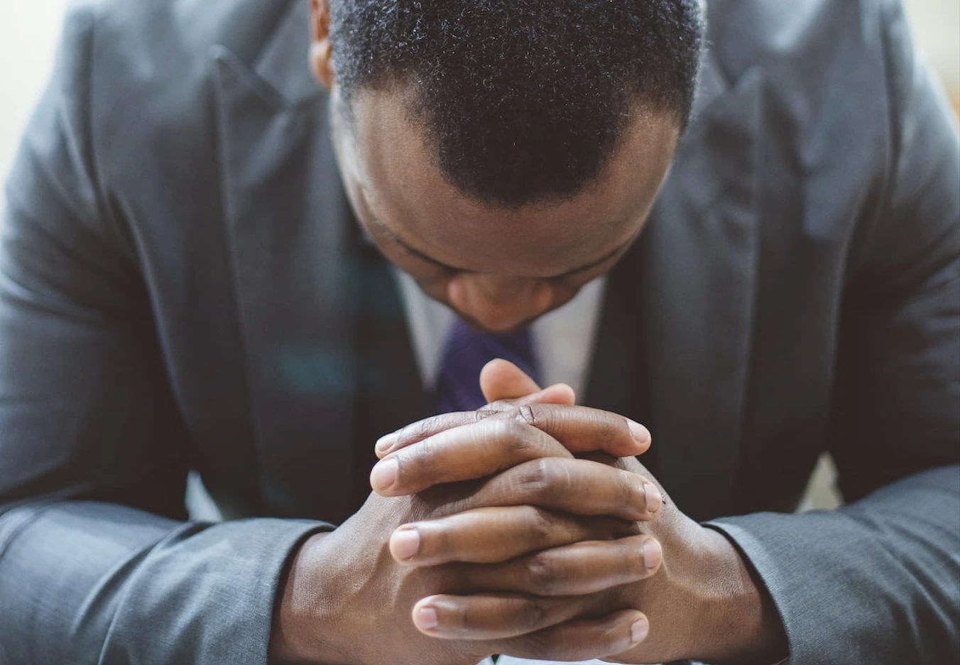 man face down praying