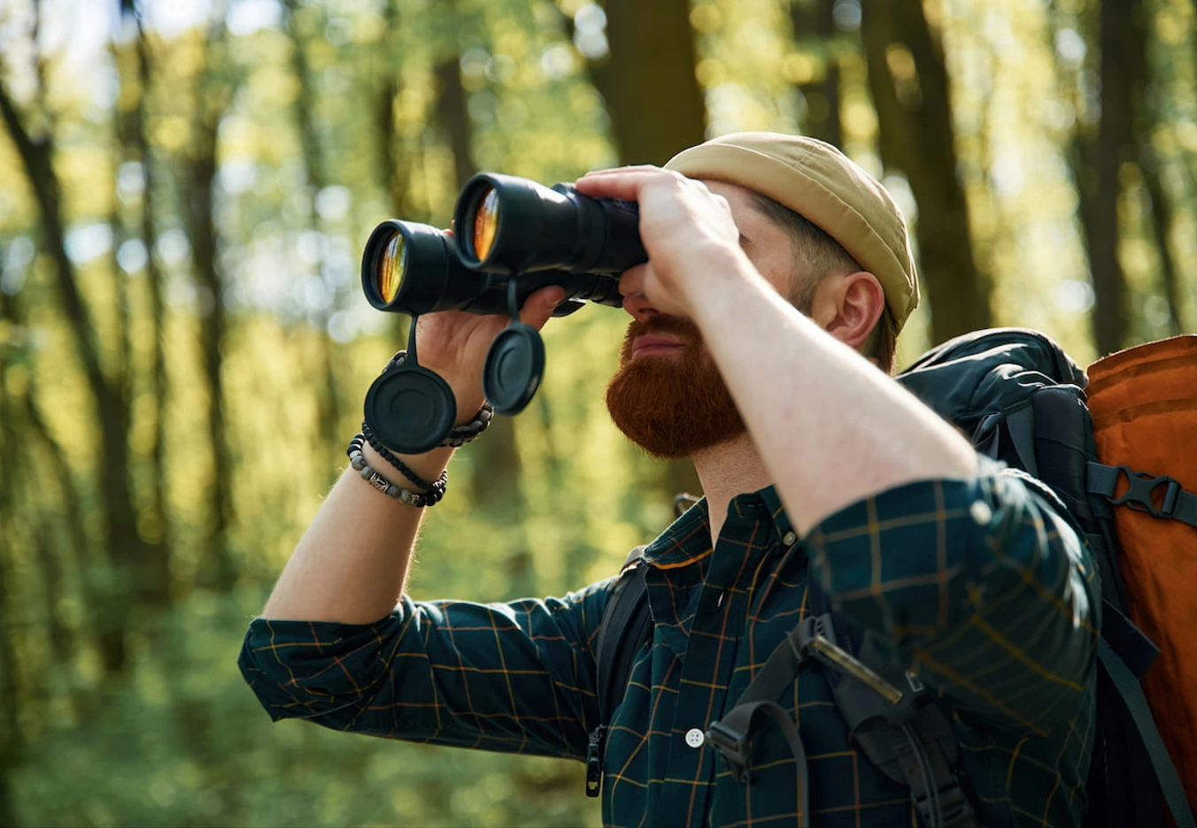 man using binoculars