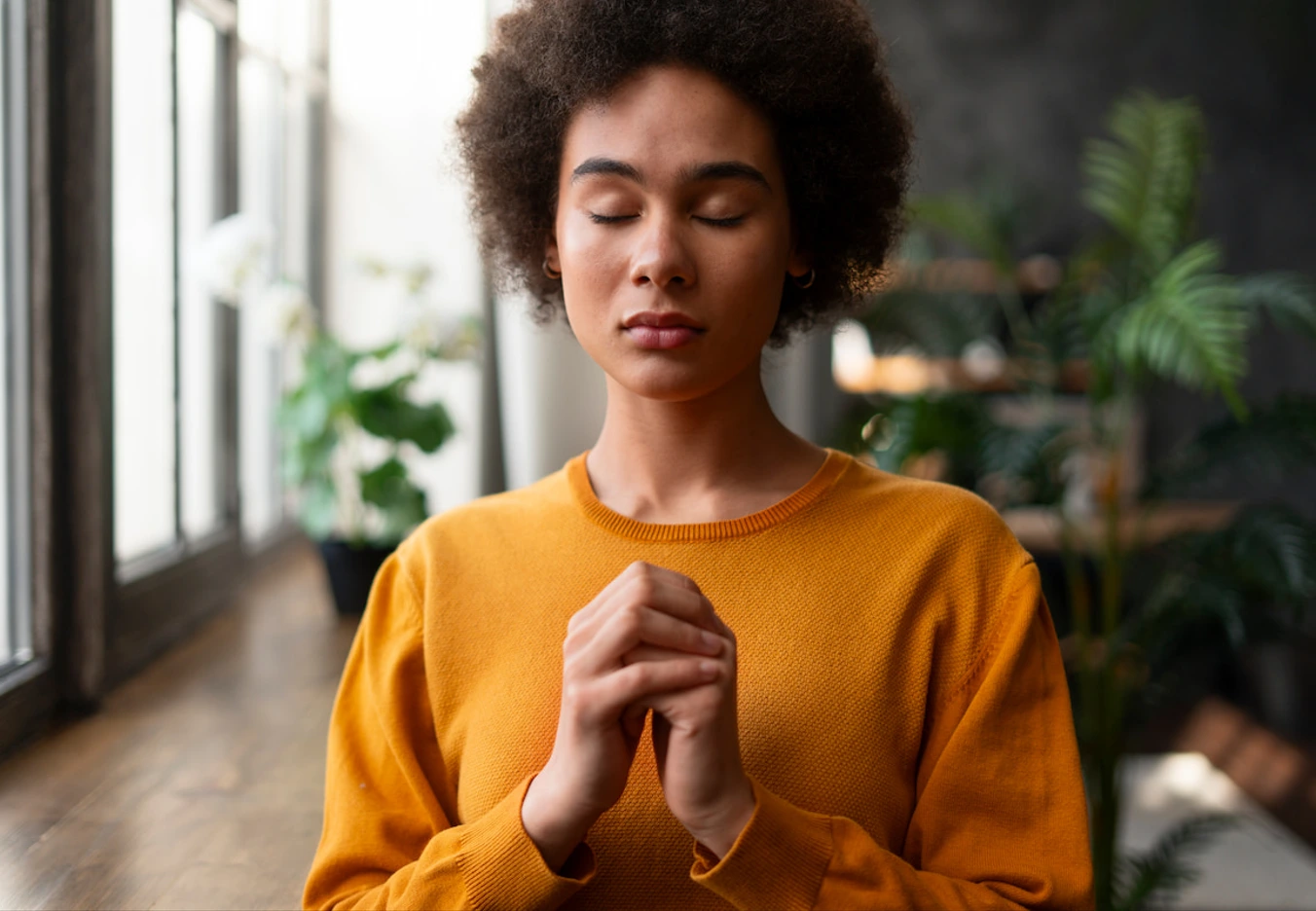 woman praying intensely