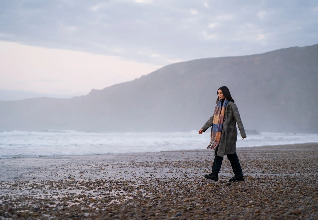 woman walking on beach